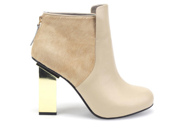 Bot&iacute;n minimalista de United Nude