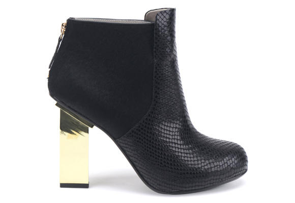 Bot&iacute;n minimalista de United Nude